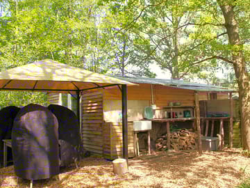 Woodmans cabin outdoor lean-to kitchen