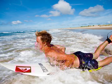 Surfing at one mile beach