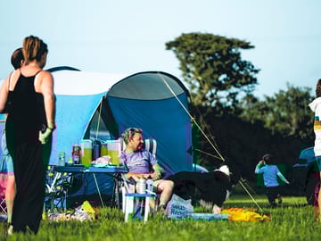 Campers enjoying evening sun