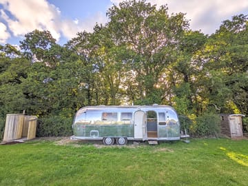 Airstream with shower and compost toilet either side