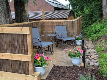 Raised private decked area with rocking seats