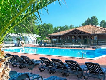 The outdoor swimming pool and solarium