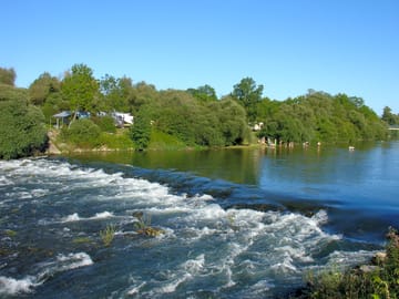 The Loue river runs past the site