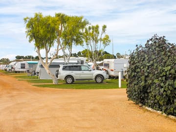 Camping grounds, grassy sites with concrete pad