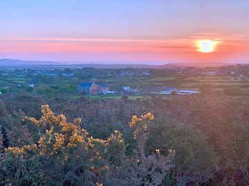 Sunset view of st ives from chycarne moor behind the farm
