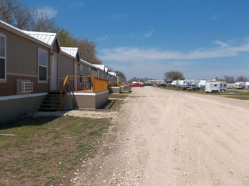 Cabins to the left, camping sites to the right