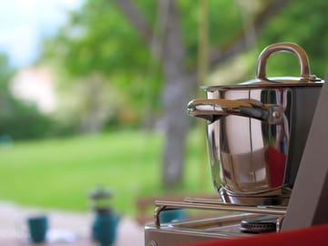 Stainless steel cookware at each tent