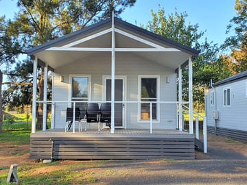 Decking outside a deluxe cabin 5