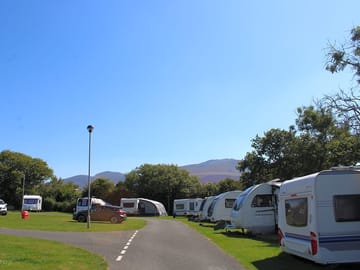 Grass pitches with mountain views