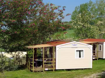 Holiday home with a shaded wooden terrace