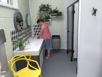 Modern shower block with under floor heating