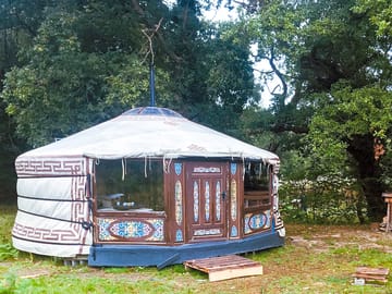 Outdside the white yurt