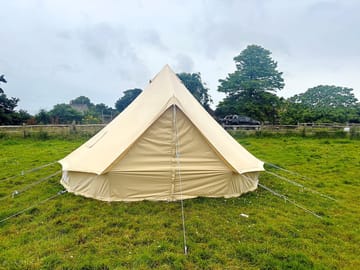 Elm bell tent comes with a hessian floor, camp beds and a firepit