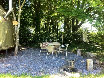 Outdoor seating next to the geodesic dome