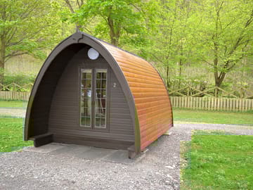 One of the pods in a lovely wooded area
