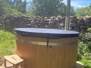 Relax in our secluded wood fired hot tubs.