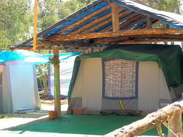 Tent pitch with camping shelter protection