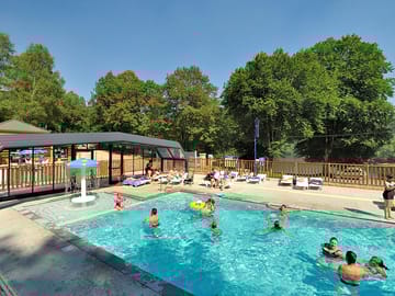 Heated pool with sliding roof
