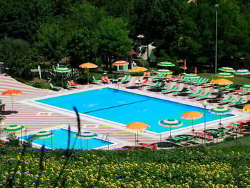 Relax on a sun lounger by the pool