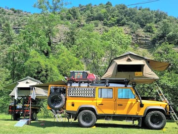Grass pitch with cliff views