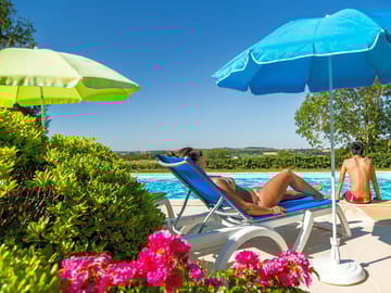 Pool with sun loungers