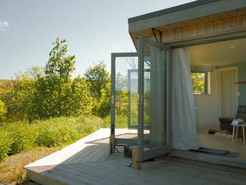 Doors open onto the garden