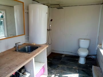 New washroom & w/c, complete with rain shower