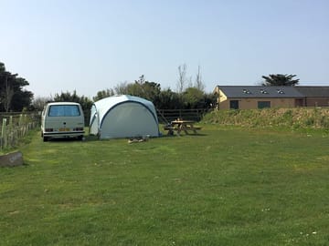 Grass pitch with a picnic bench