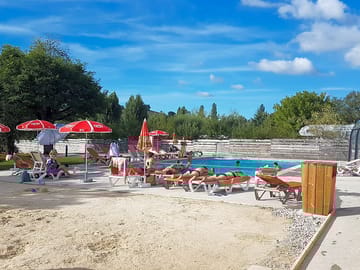 Pool with sandy beach