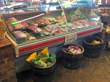 Our well stocked butchers counter in the farm shop