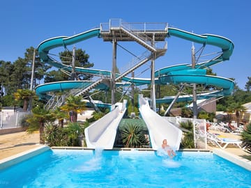Try out the giant slides to get into the pool