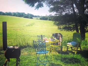 Seating area outside the van, with exclusive use of the wood burner
