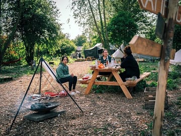 Cook in the communal outdoor kitchen or outside your own unit