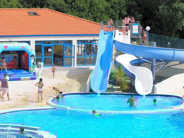 The swimming pool, bouncy castle, waterslides and paddling pool