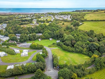 Aerial view of the site with Lligwy Bay in the background