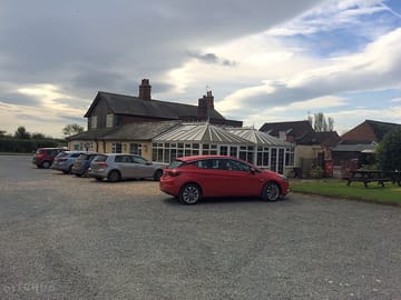 Spacious car park at the access to the site