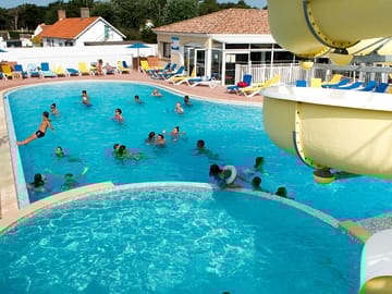 Outdoor heated pool with waterslide