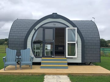 Front of Pod and decking, seating area.