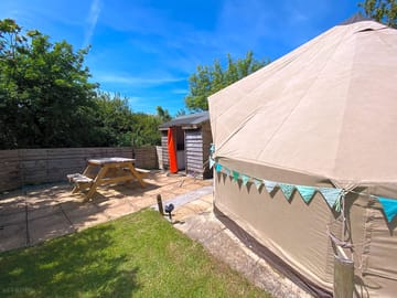 Private seating and kitchen for sunset tent