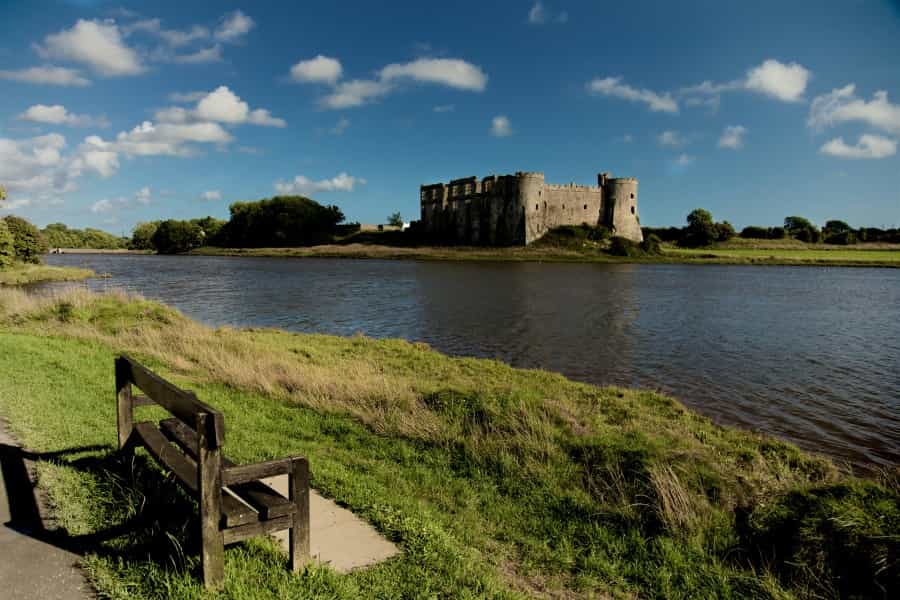 Carew Castle and its mill pond (Paolo Chiabrando/Unsplash)