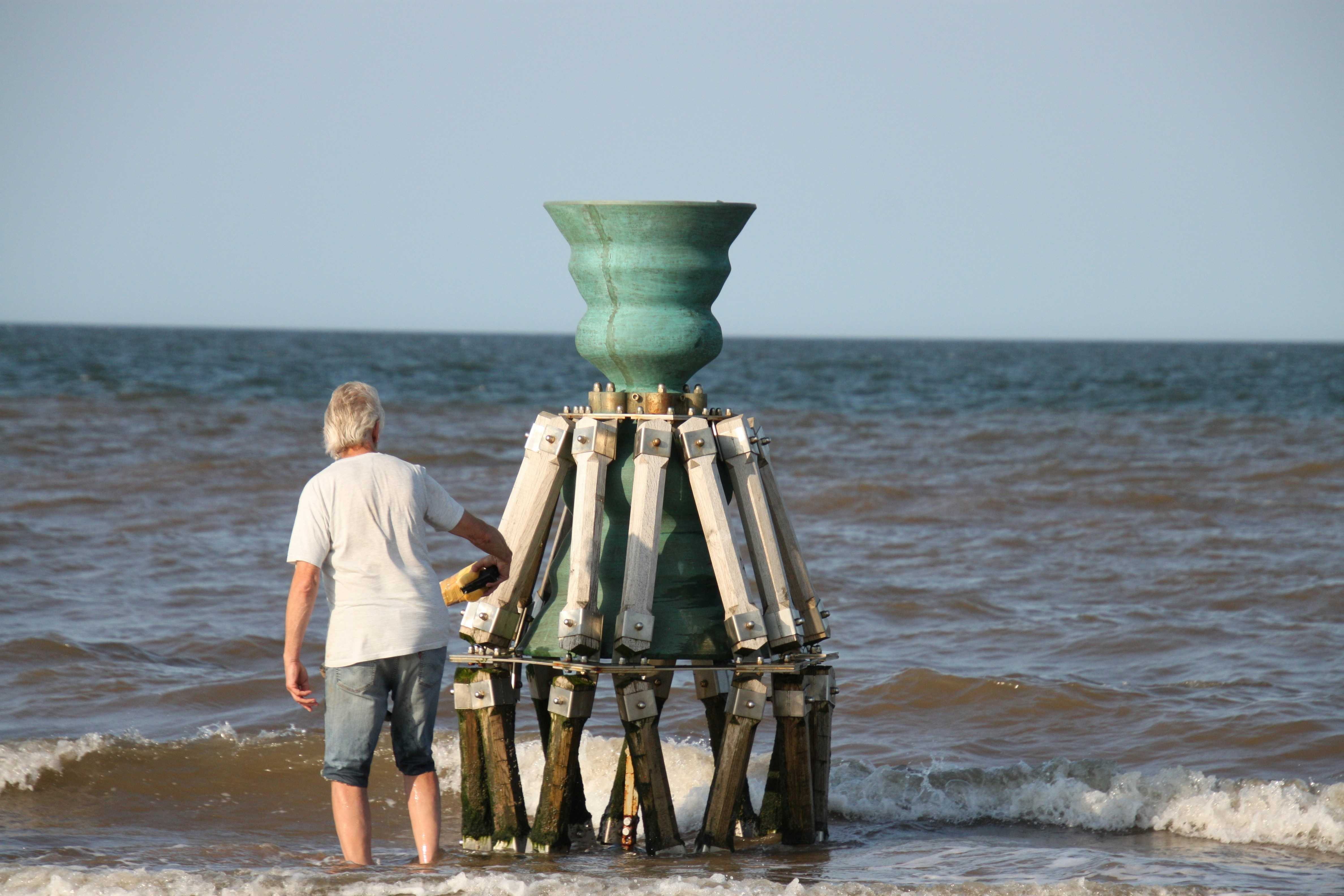 The Tide and Time Bell on Theddlethorpe Beach (Christopher Sanderson/Unsplash)