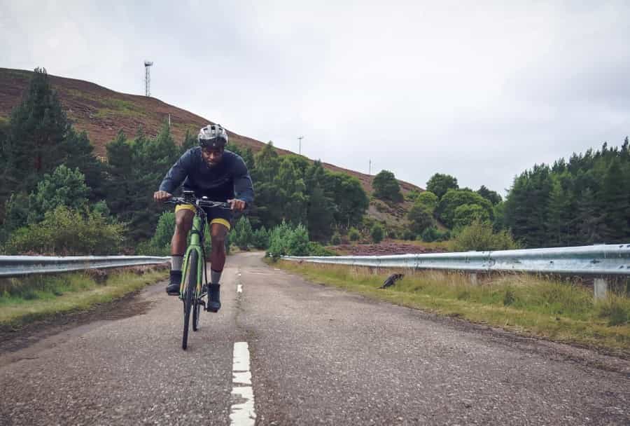 Cycling near Aviemore (Bayo Adegunloye/Unsplash)